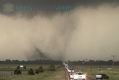 Storm chasers drive ahead of a multivortex tornado in northern Oklahoma May 10, 2010. Photo by Chris Kridler, ChrisKridler.com, SkyDiary.com