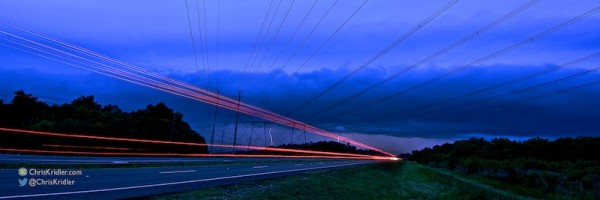 I loved the lines here: power lines, the laminar shelf cloud and lights on the road, with a bit of lightning in the background. Shot west of Cocoa, Florida, on April 13, 2015. Photo by Chris Kridler, ChrisKridler.com