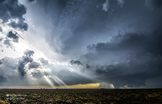 A supercell May 24 at Dodge City, Kansas, spins with a large tornado beneath it. Photo © by Chris Kridler, ChrisKridler.com, SkyDiary.com