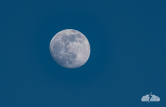 The moon over Badlands National Park in South Dakota.