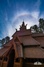 A sun halo shines behind the Chapel in the Hills.