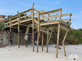 You can see on the posts how high the sand once was.