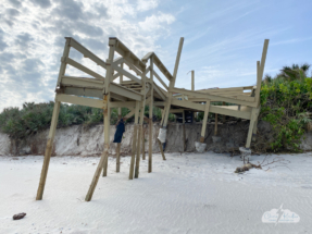 Concrete footings hang in midair.