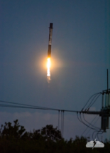 The booster lands at Cape Canaveral.