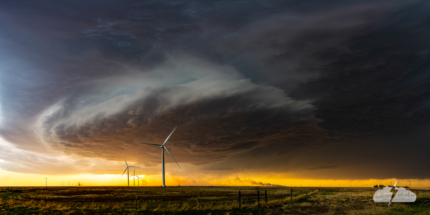 &amp;quot;Be Careful What You Wish For &amp;quot; - A supercell churns over wind turbines and the smoke of a lightning fire at sunset in the Texas Panhandle, May 18, 2022. Available at StolenButter.com. Photo © Chris Kridler, ChrisKridler.com