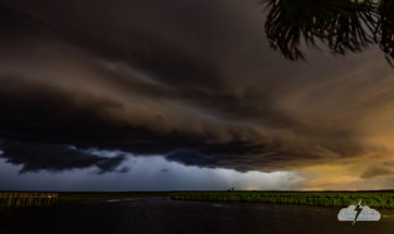 Most of the lightning was hidden in the clouds. The line formed a shelf cloud as it moved east over the St. Johns River.