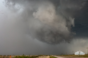 We dashed north and caught this rotating wall cloud.