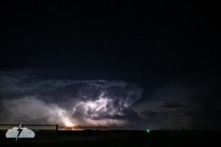 A nice bolt illuminates the cloud.