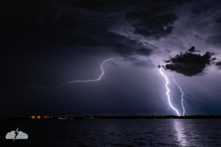 Cloud-to-ground lightning with a one bolt taking a detour.