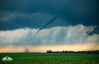 A dust spinup under the tornado.