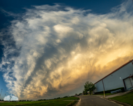 The anvil of the departing storm had interesting structure.