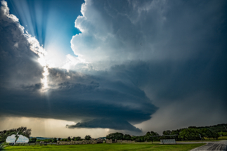 One more look, with the sunburst of rays behind the storm.