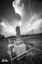 A pretty little monument in front of the storm.