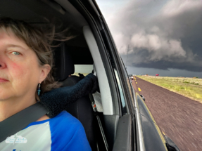 Fleeing the hail in the conga line of chasers!