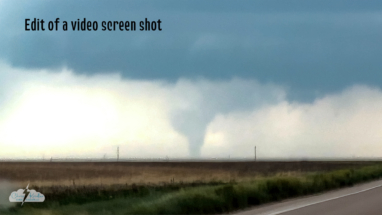 We headed north into Kansas and barely caught an apparent tornado near Manter, Kansas. Here's a rough video grab.