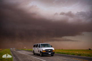 Chasers plunge out of the dust.