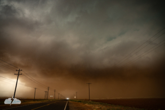 There's a tornado buried in the dust, corresponding with storm reports.