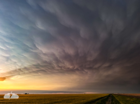 Sometimes the back side of the storm is the prettiest. As we headed north, we stopped to watch.