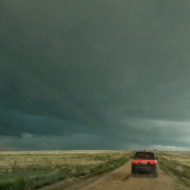 A screen grab from the GoPro dash cam shows falling hail. We avoided the worst of it.