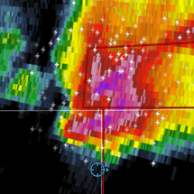 We stayed south of the worst hail in spite of tense navigation of the chaser traffic jam around the tornado-warned storm.
