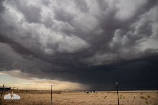 A closer look at the storm to the west and the dust under it.