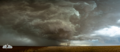 A multi-image panorama shot of the storm near Abernathy with the baby tornado.