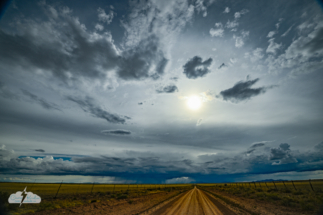 On the way to Santa Fe, we stopped to eye the sky. On the way to Santa Fe, we stopped to eye the sky.