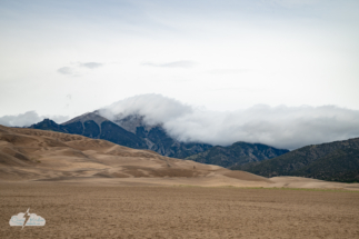 A hiker out on the dunes.