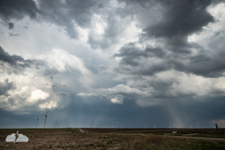 We paused near Levant, Kansas, to observe the storms.
