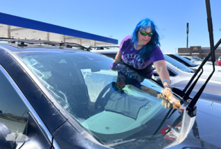 Alethea applies the Rain-X prior to our May 30 chase with Jason.