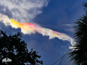 Cloud iridescence above central Florida storms on July 4.