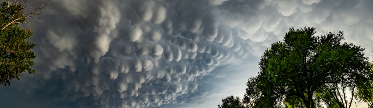 A multi-image panorama of the mammatus show.